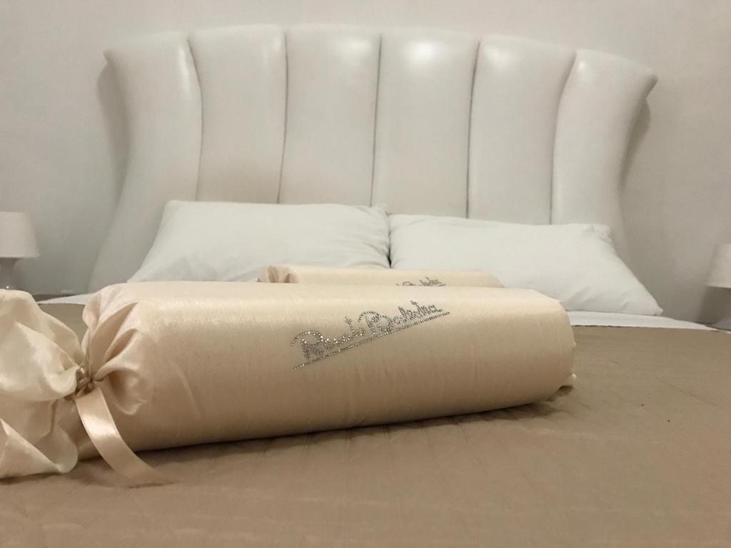 Postel nebo postele na pokoji v ubytování Casa Vacanze Mamarose