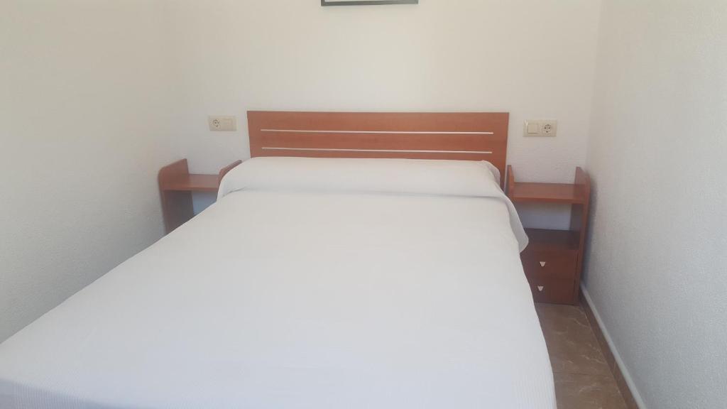 Postel nebo postele na pokoji v ubytování Camping Los Pinos