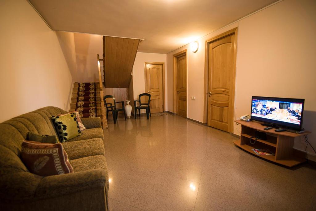 TV a/nebo společenská místnost v ubytování G&G House