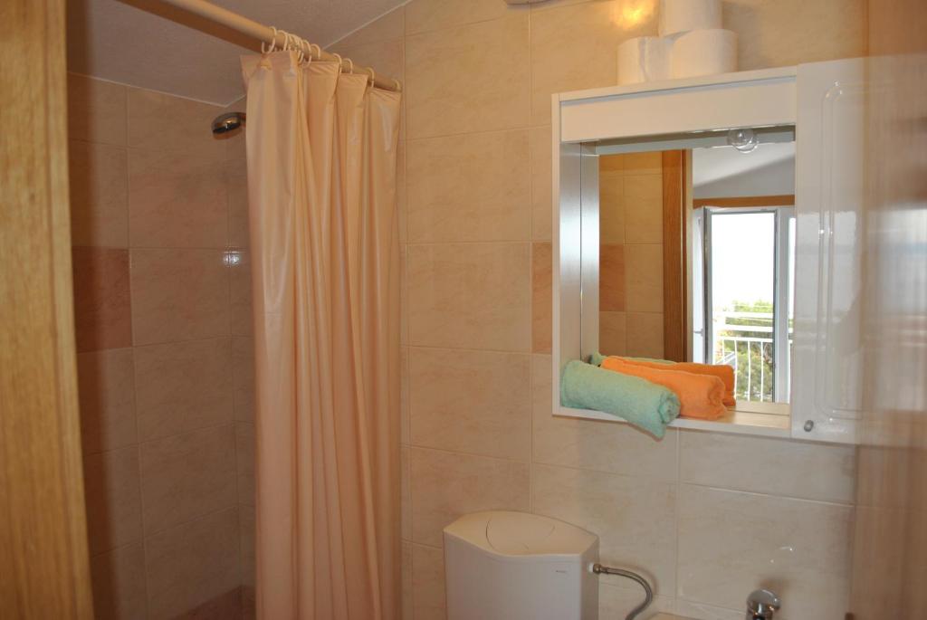 Koupelna v ubytování Apartmani Dalmadino
