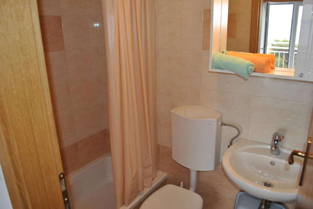 Koupelna v ubytování Apartmani Dalmadino