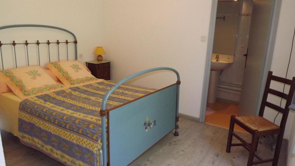 Postel nebo postele na pokoji v ubytování La Bastide