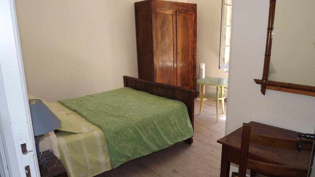 Postel nebo postele na pokoji v ubytování La Bastide