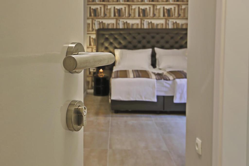 Posteľ alebo postele v izbe v ubytovaní Spalato Luxury Rooms
