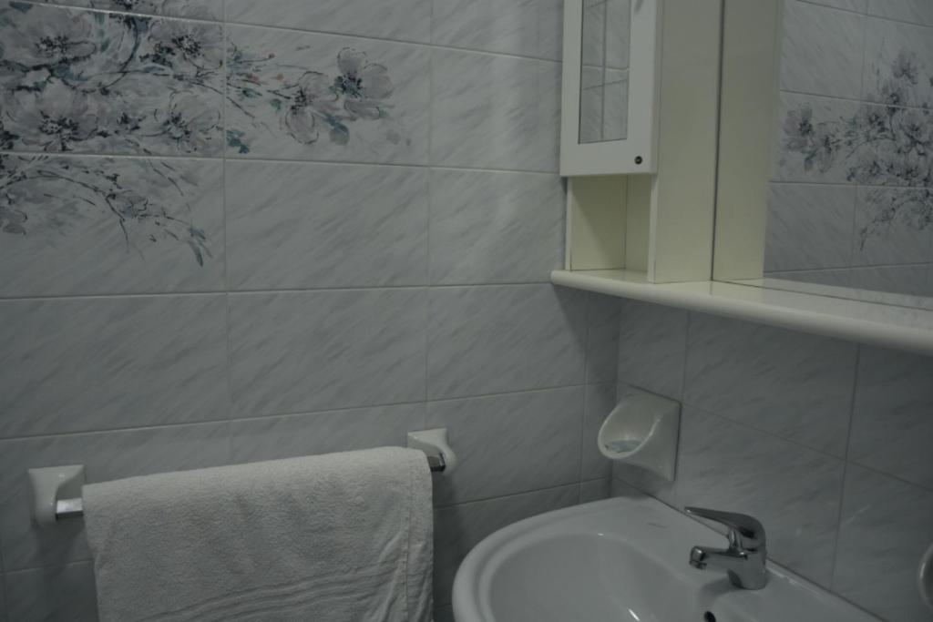 Koupelna v ubytování Hotel Giotto