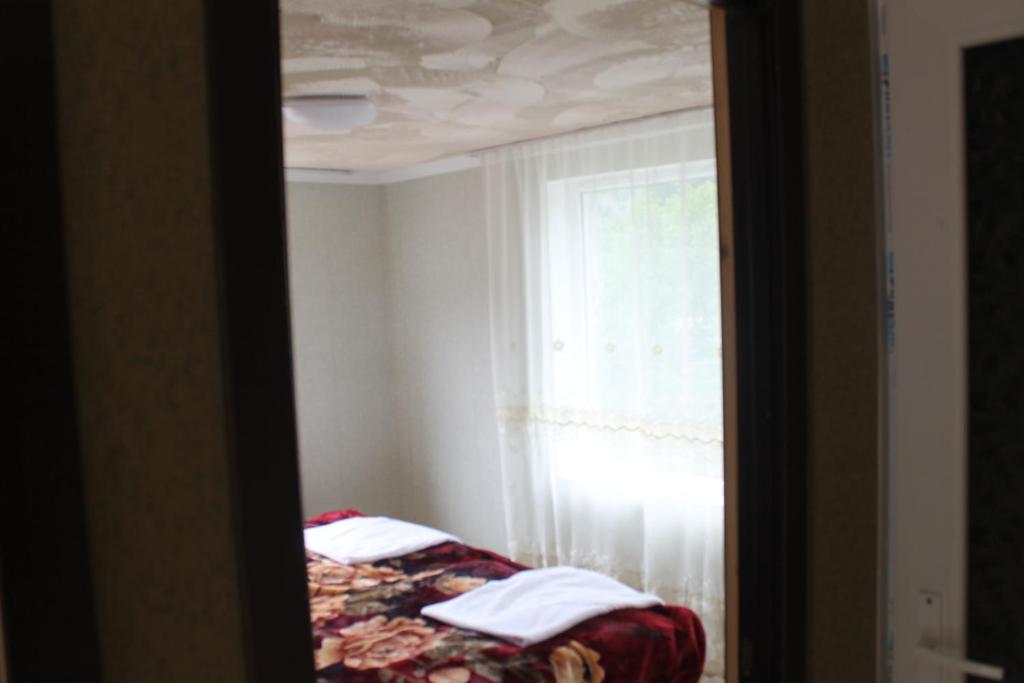 Postel nebo postele na pokoji v ubytování Iason Guest House in Mazeri