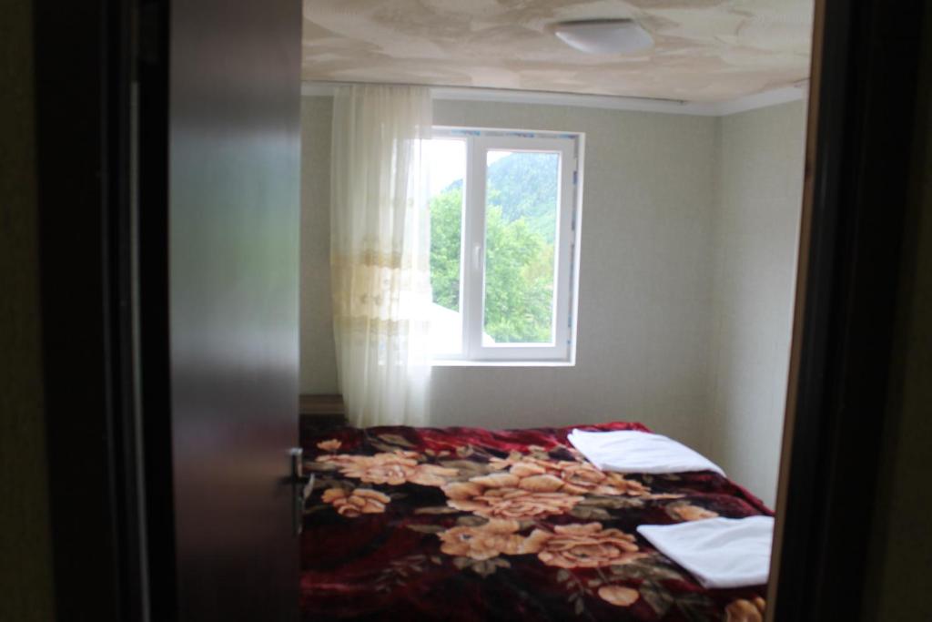 Postel nebo postele na pokoji v ubytování Iason Guest House in Mazeri