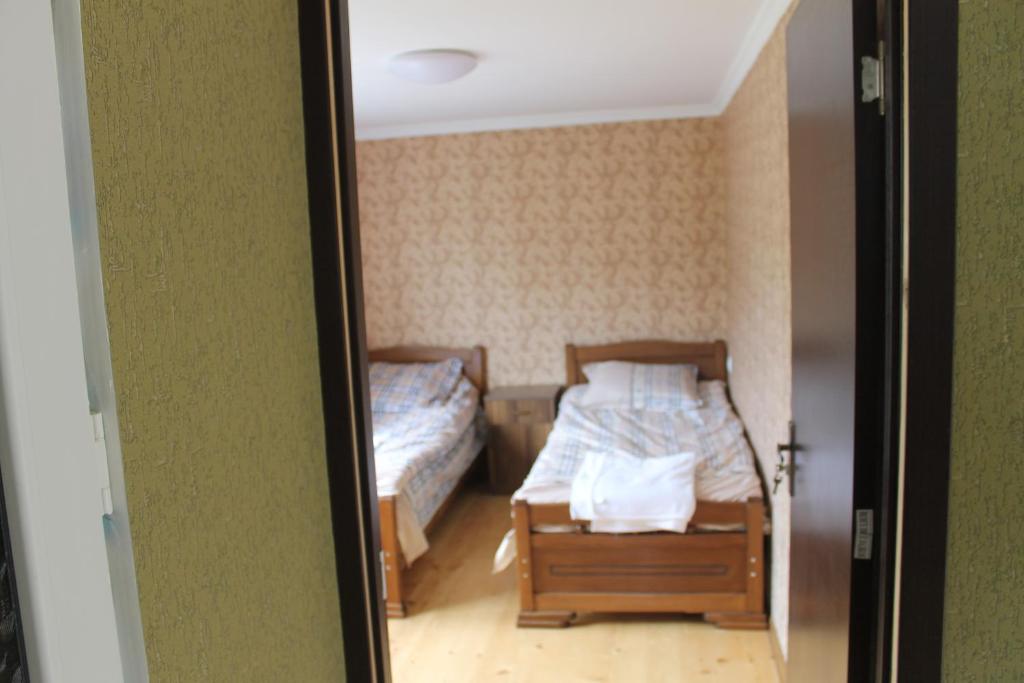 Postel nebo postele na pokoji v ubytování Iason Guest House in Mazeri