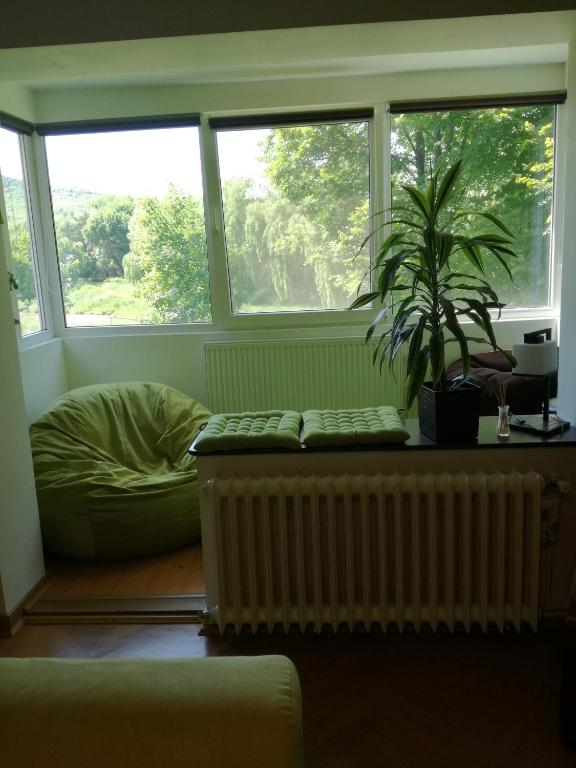 Posezení v ubytování Green Apartment
