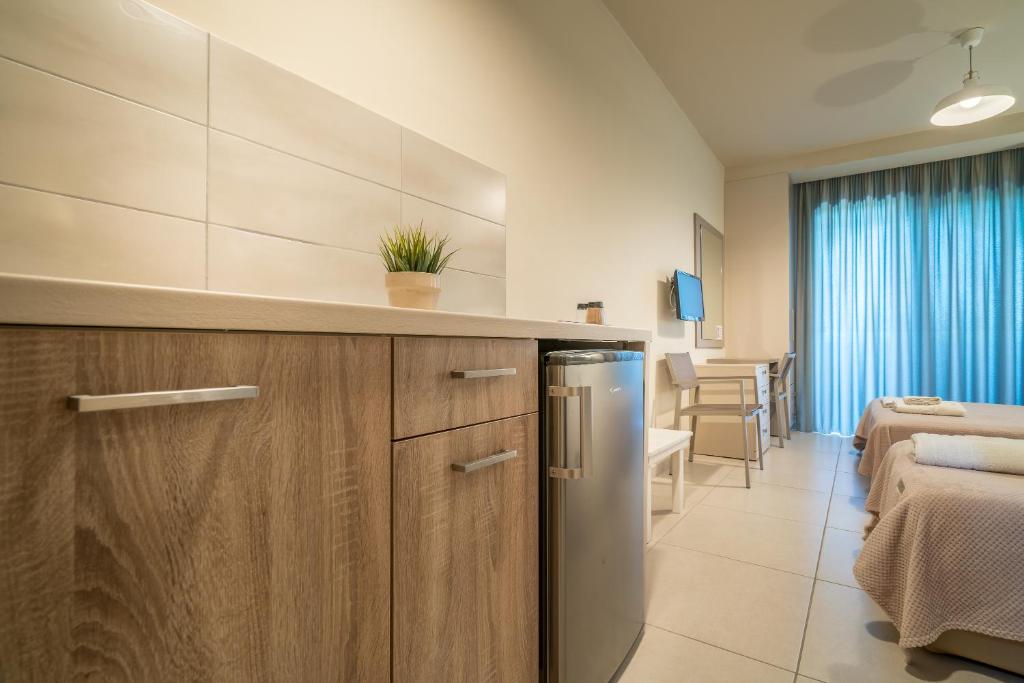 A kitchen or kitchenette at Fiore Beach Studios