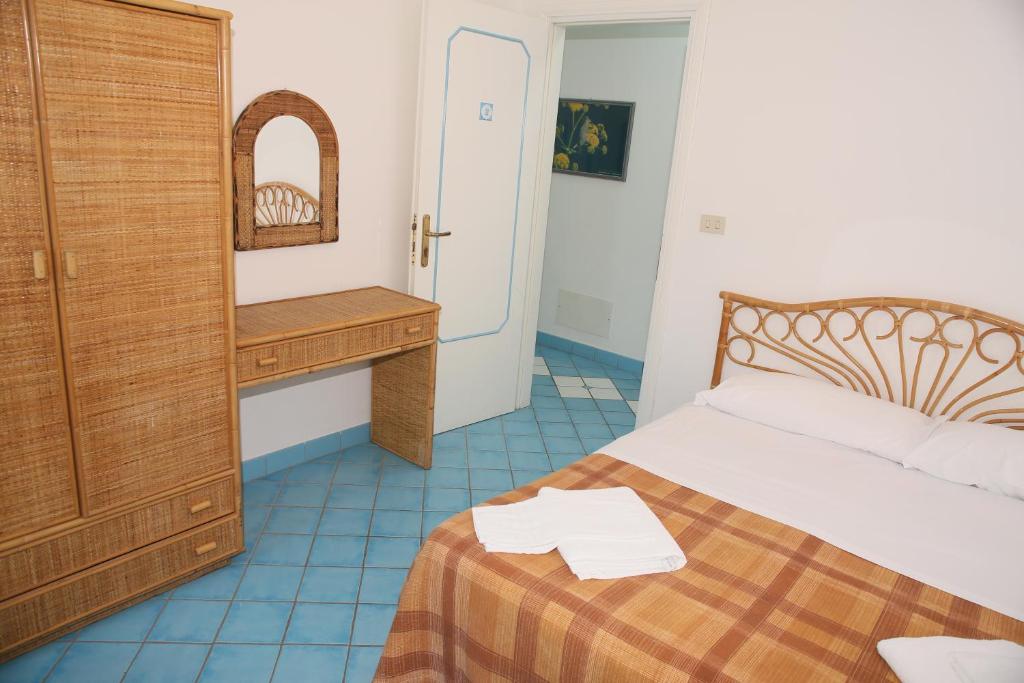 Postel nebo postele na pokoji v ubytování Affittacamere Via Muraglione