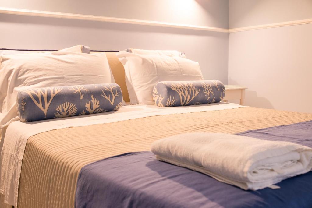 Postel nebo postele na pokoji v ubytování B&B Gioia Resort