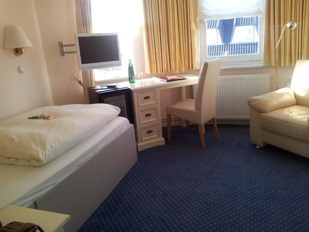 Postel nebo postele na pokoji v ubytování Hotel Hansa