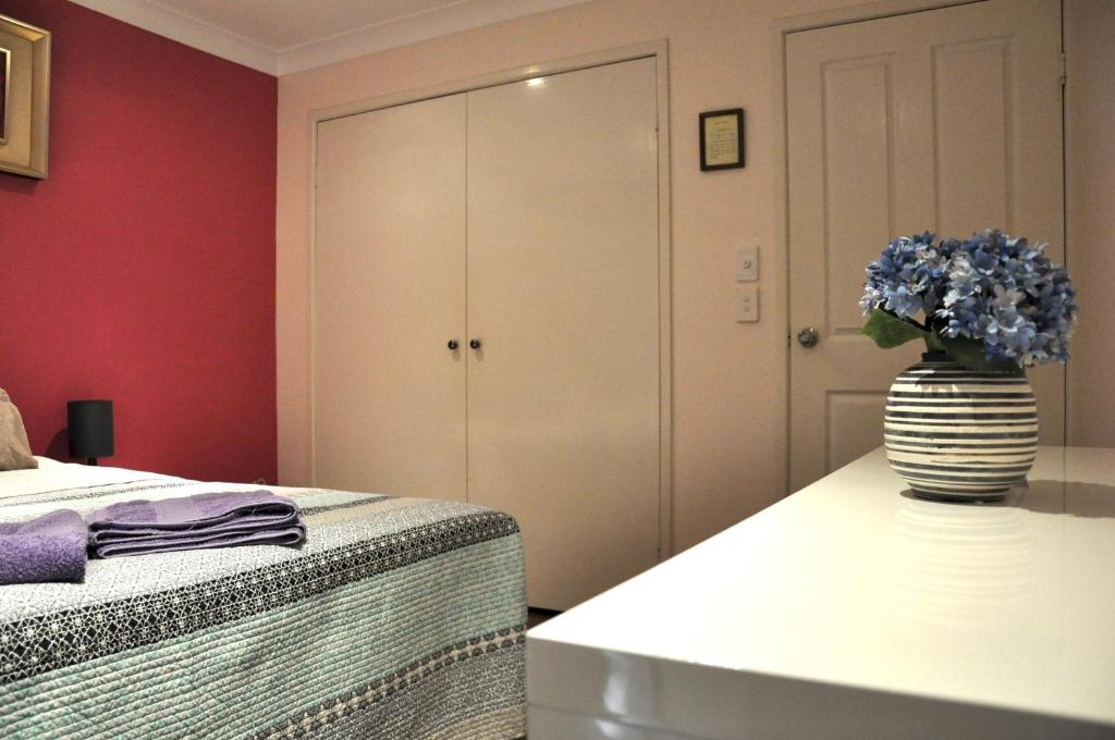 Postel nebo postele na pokoji v ubytování TL Warmest Homestay