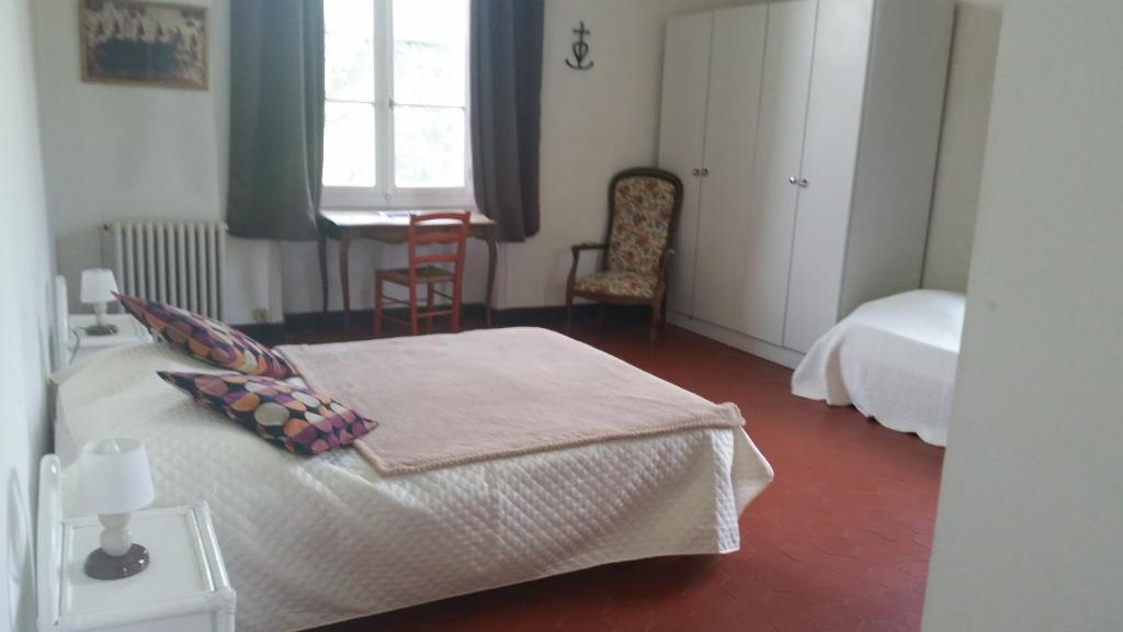 Letto o letti in una camera di Le Mas d'Icard