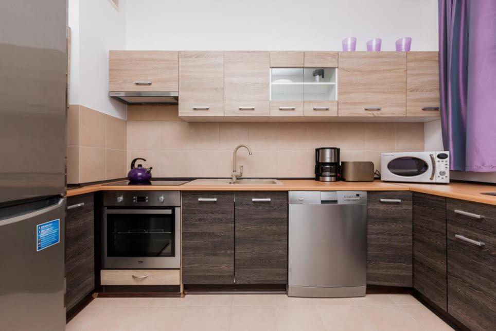 Kuchyňa alebo kuchynka v ubytovaní Apartamenty Platan