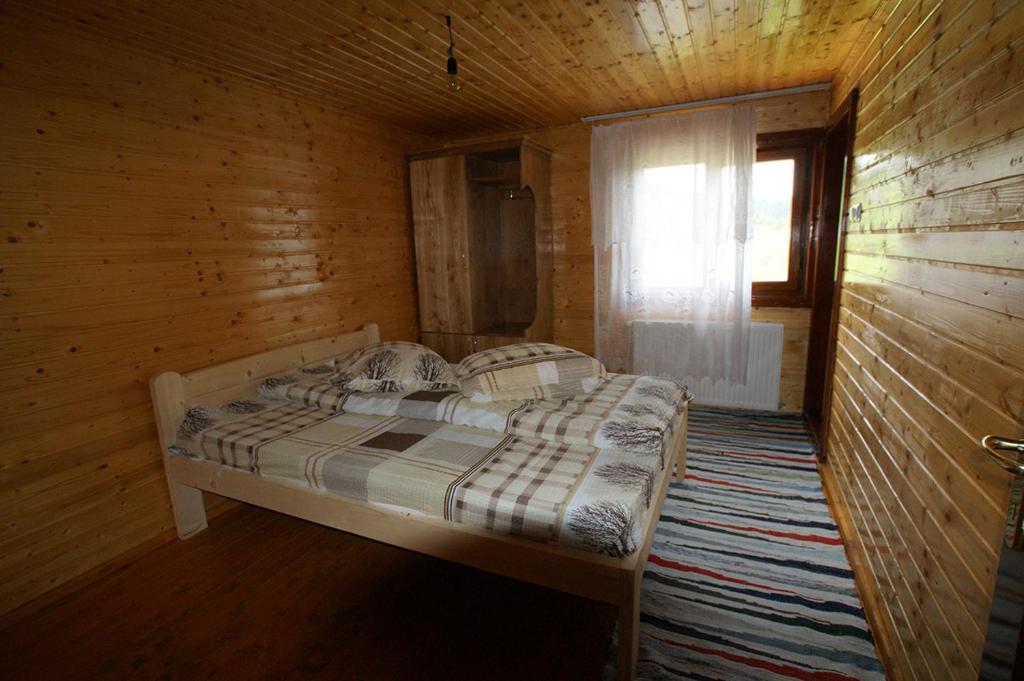 Postel nebo postele na pokoji v ubytování Cabana Ioana