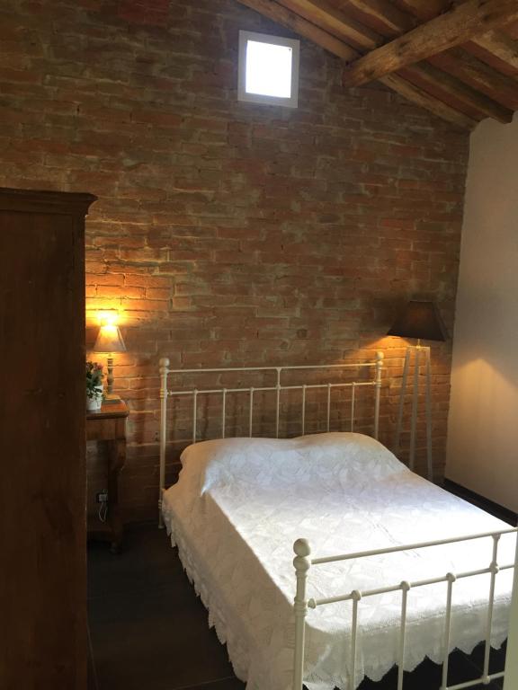 Postel nebo postele na pokoji v ubytování Casa Del Principe