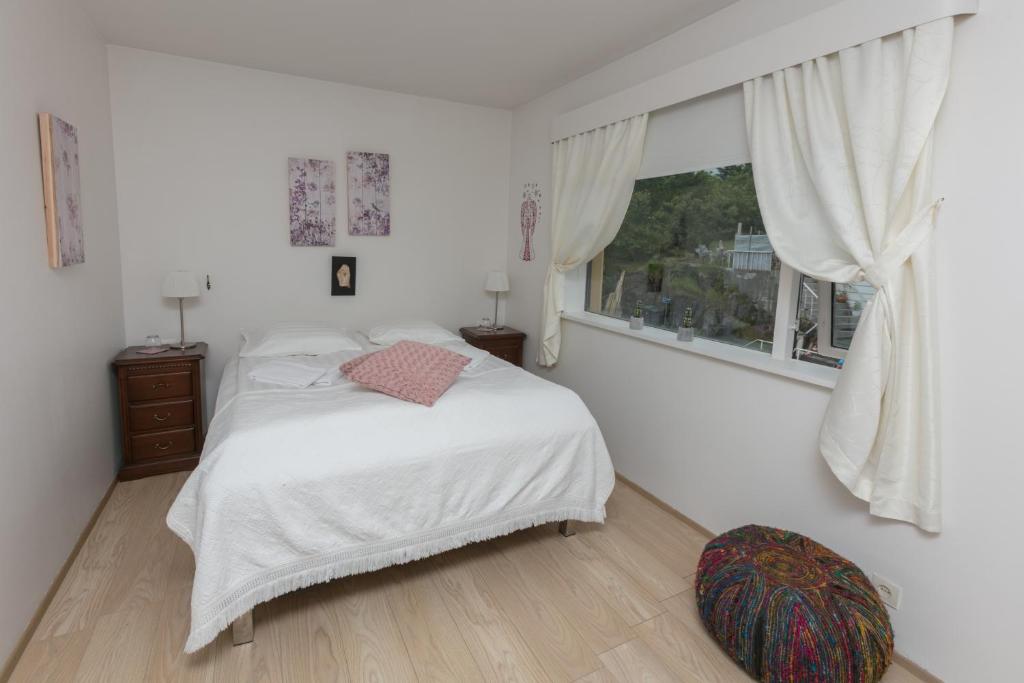 Cama o camas de una habitación en Blómasetrið Homestay