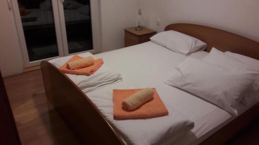 Posteľ alebo postele v izbe v ubytovaní Apartment Sano