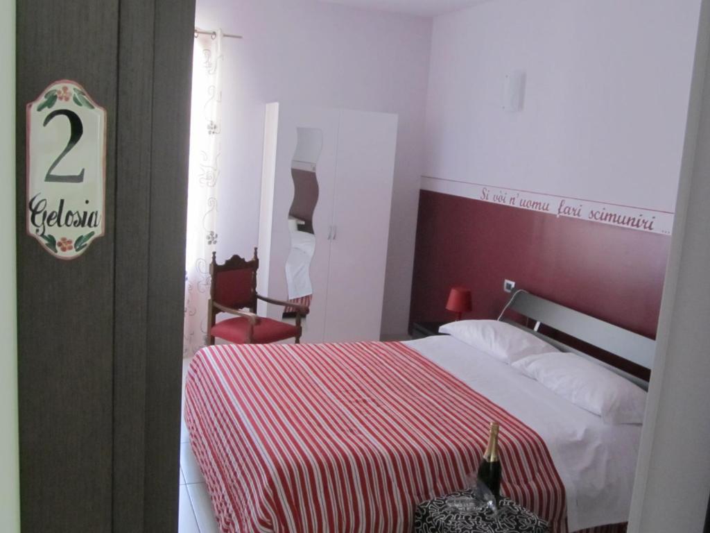Postel nebo postele na pokoji v ubytování B&B Persi Nel Sud, Pozzallo