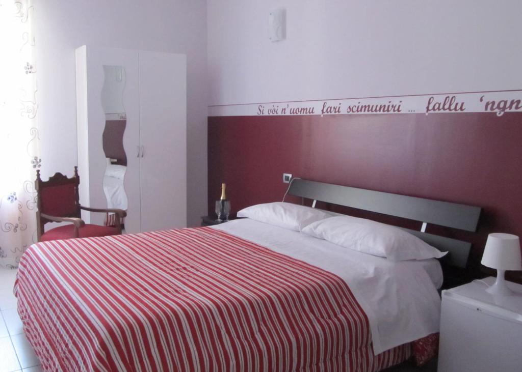 Postel nebo postele na pokoji v ubytování B&B Persi Nel Sud, Pozzallo