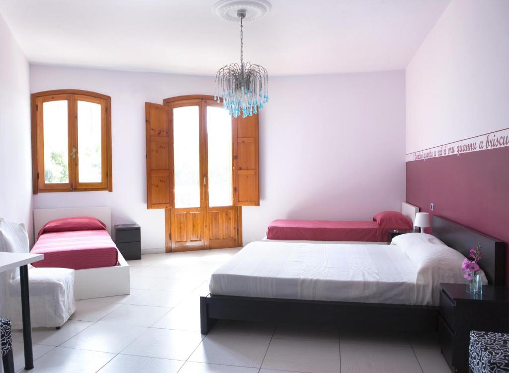 Postel nebo postele na pokoji v ubytování B&B Persi Nel Sud, Pozzallo