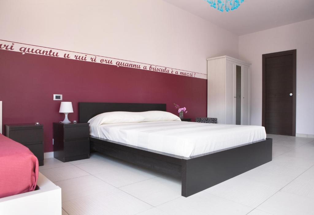 Postel nebo postele na pokoji v ubytování B&B Persi Nel Sud, Pozzallo
