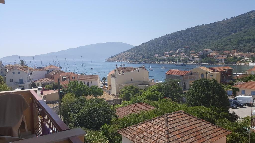 a town with a view of the water at Moustakis Hotel in Ayia Evfimia