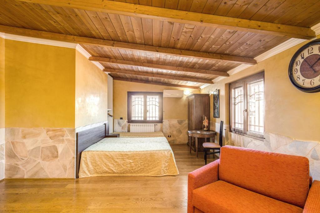 Postel nebo postele na pokoji v ubytování Villa Gengi