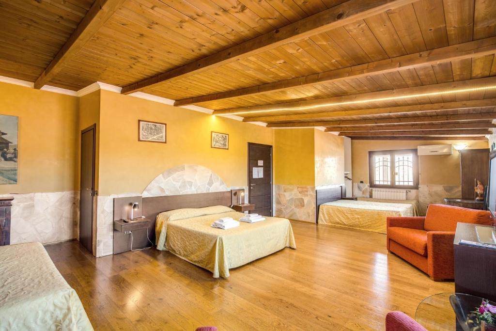 Postel nebo postele na pokoji v ubytování Villa Gengi