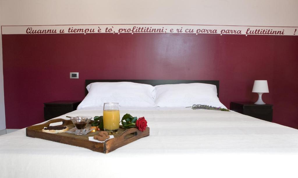 Postel nebo postele na pokoji v ubytování B&B Persi Nel Sud, Pozzallo