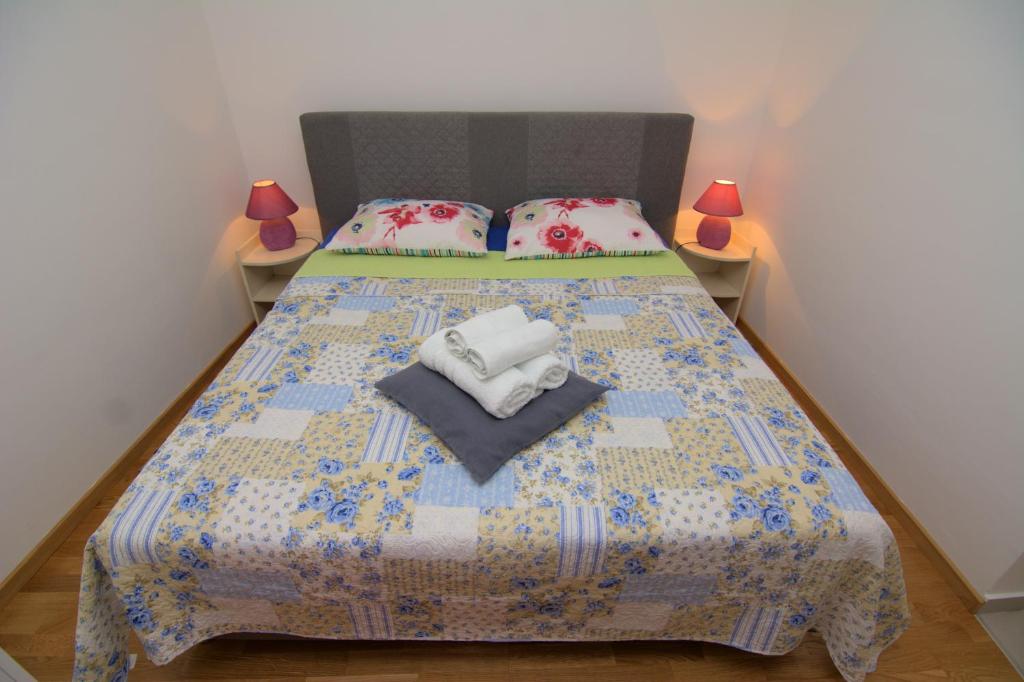 Postel nebo postele na pokoji v ubytování Krnic NEW Fiore