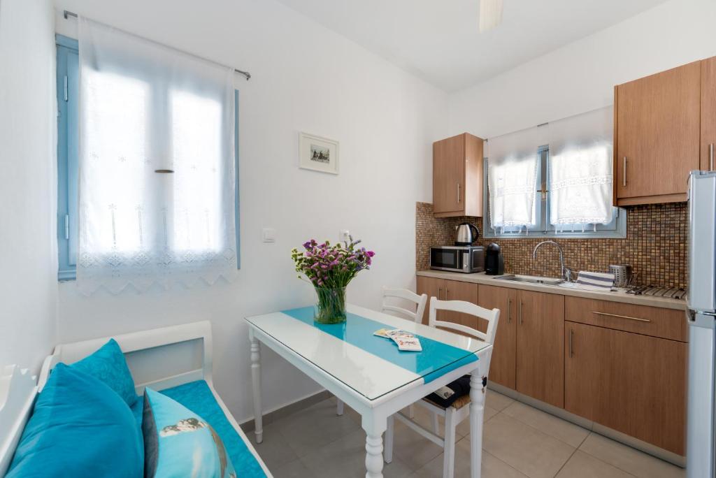 Kuchyň nebo kuchyňský kout v ubytování Folia Apartments