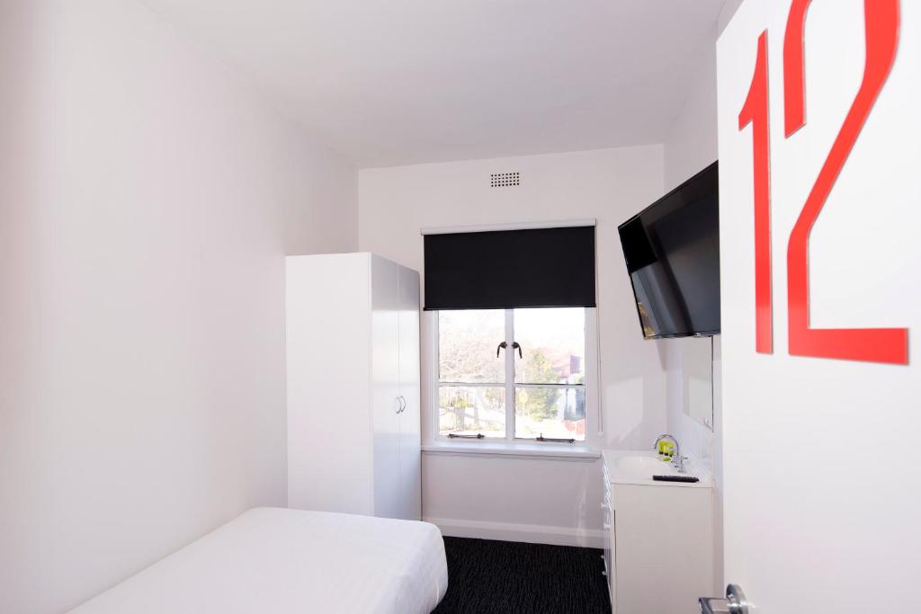 Postel nebo postele na pokoji v ubytování Mowbray Hotel