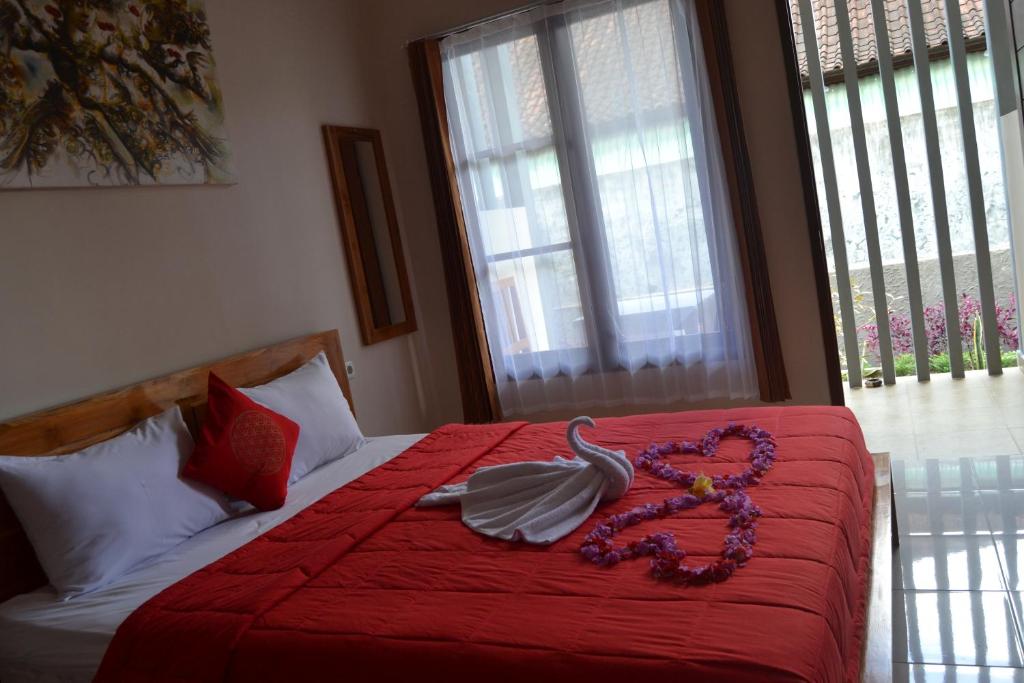 Postel nebo postele na pokoji v ubytování Sakha House