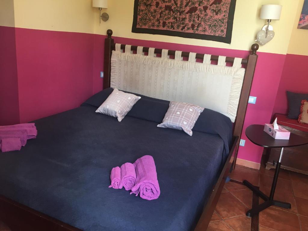 Postel nebo postele na pokoji v ubytování Mondello Room