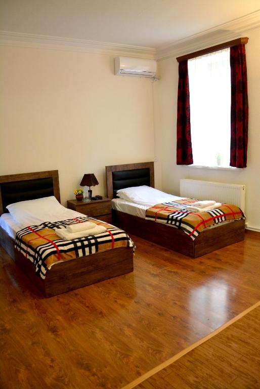 Postel nebo postele na pokoji v ubytování Hotel Canyon