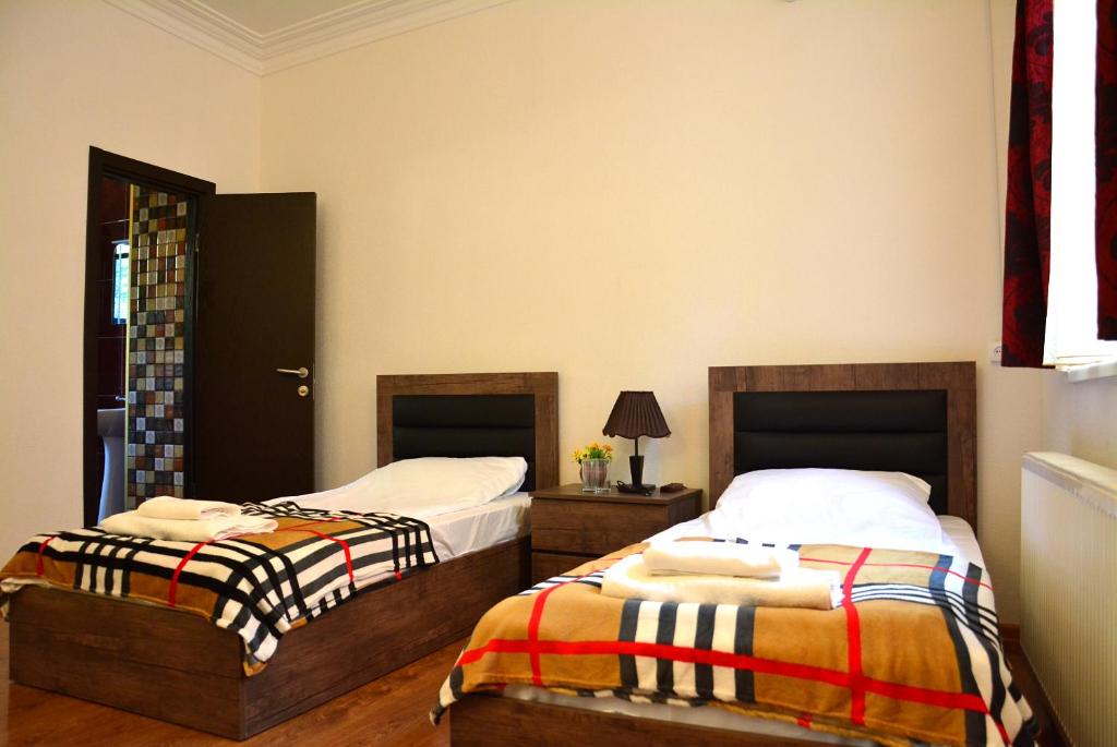 Postel nebo postele na pokoji v ubytování Hotel Canyon