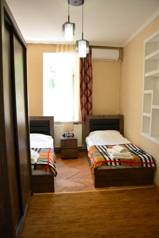 Postel nebo postele na pokoji v ubytování Hotel Canyon