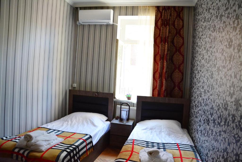 Postel nebo postele na pokoji v ubytování Hotel Canyon