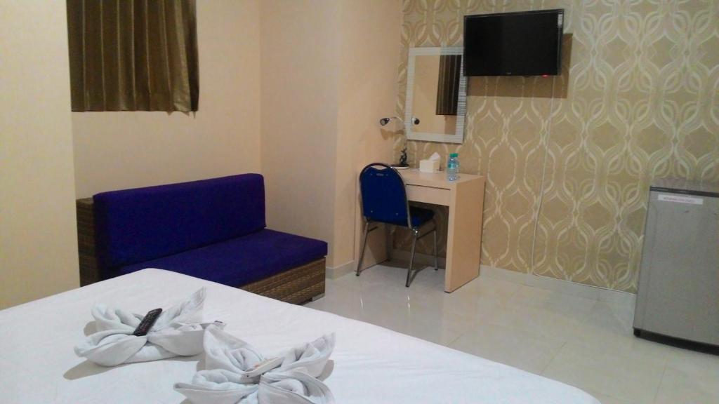 TV a/nebo společenská místnost v ubytování SWK 95 Hotel