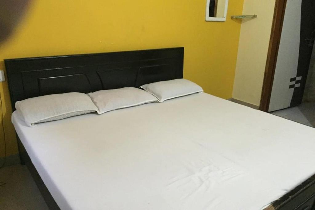 Postel nebo postele na pokoji v ubytování Hotel New City Inn