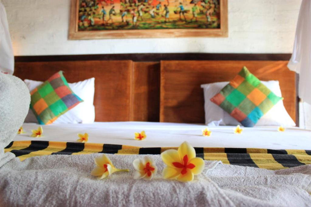 Postel nebo postele na pokoji v ubytování Sudi Guest House