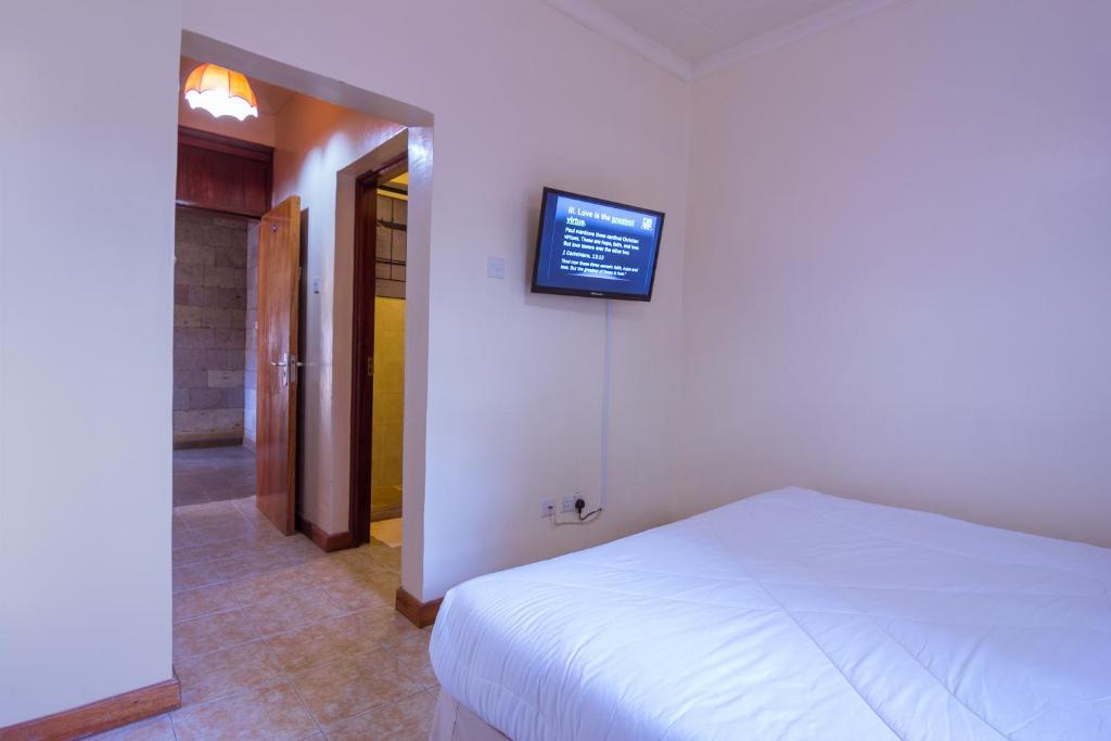 TV a/nebo společenská místnost v ubytování Chak Guesthouse & Conference Center