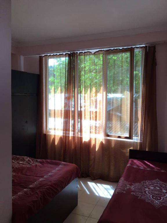 Postel nebo postele na pokoji v ubytování Hotel Nino Ureki