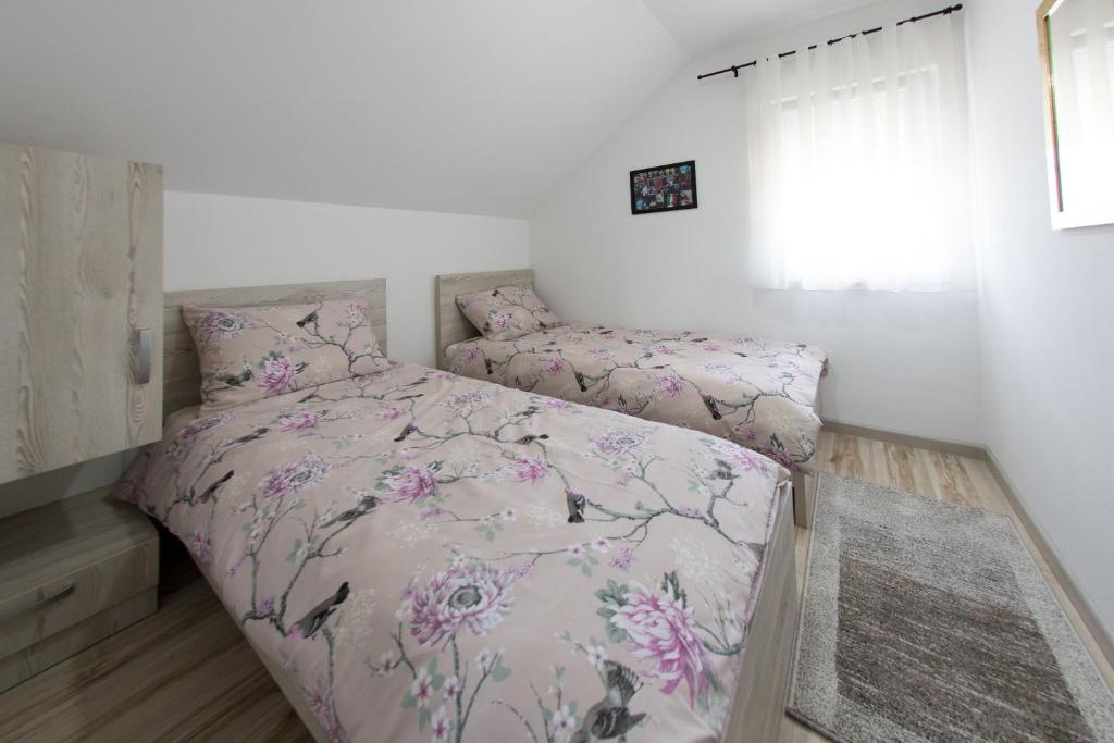 Posteľ alebo postele v izbe v ubytovaní Apartment Kalimero