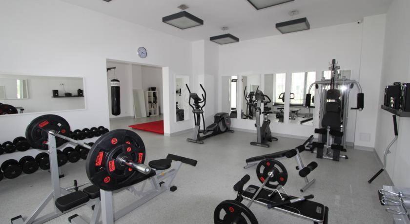 Posilňovňa alebo fitness centrum v ubytovaní Apartament Szmaragdowy