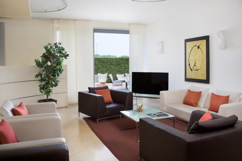 TV a/nebo společenská místnost v ubytování Hotel Montemezzi
