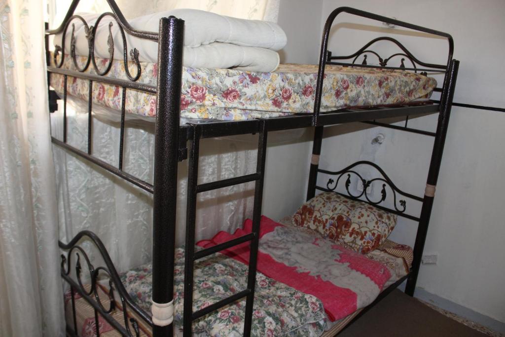 Letto o letti in una camera di Bunksurfing Hostel